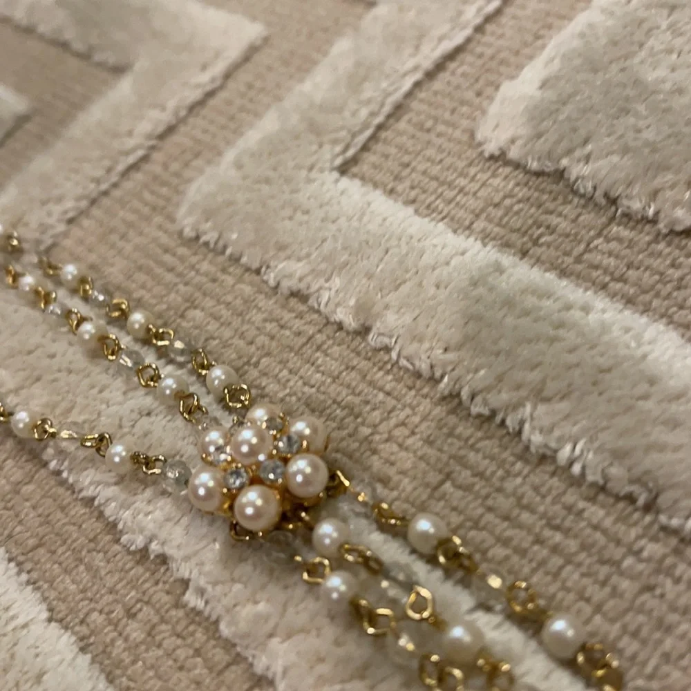 Delicate multi chain gold and pearl choker necklace